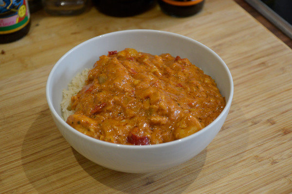 Chicken tikka curry served over rice